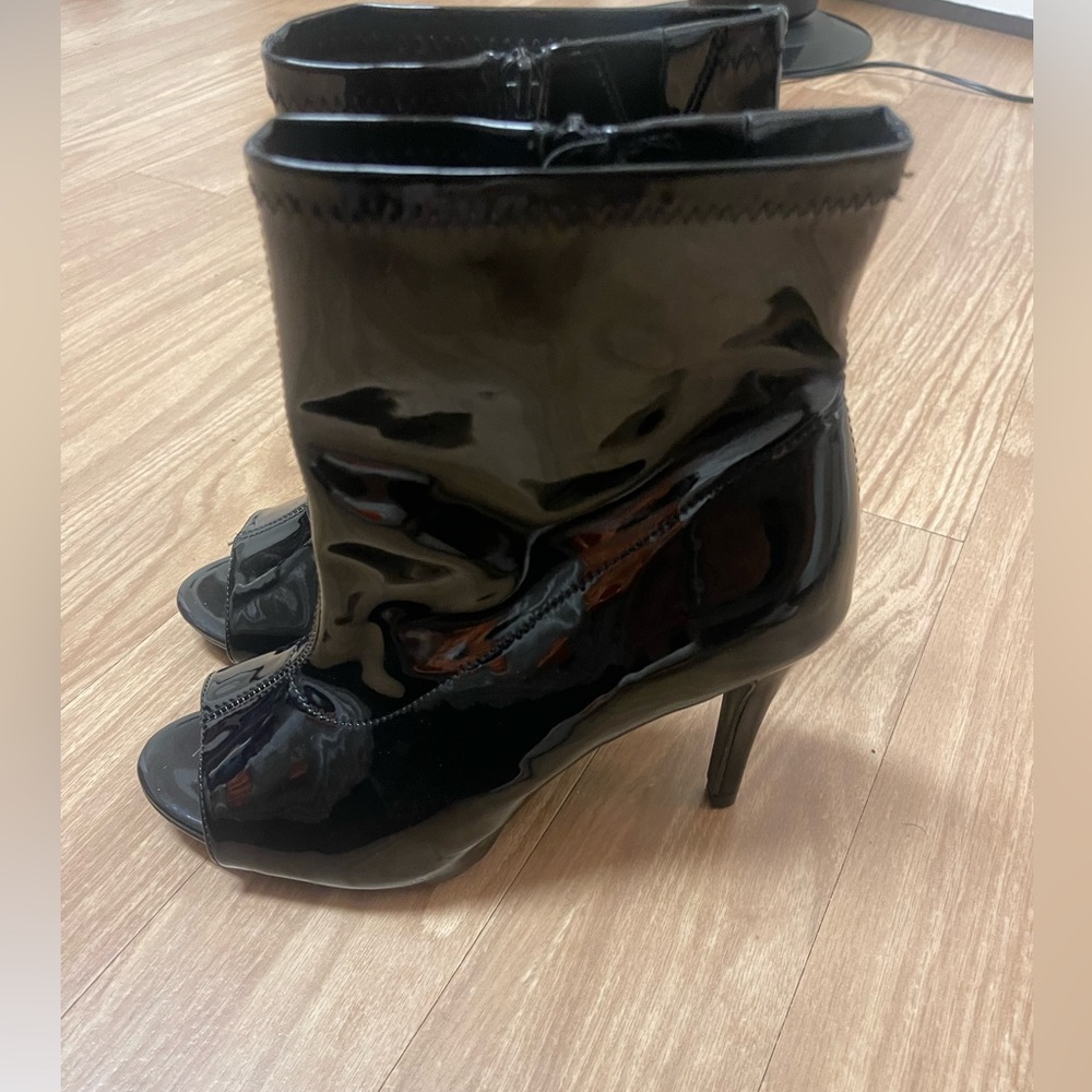 Torrid Woman’s black peep toe bootie 9.5
